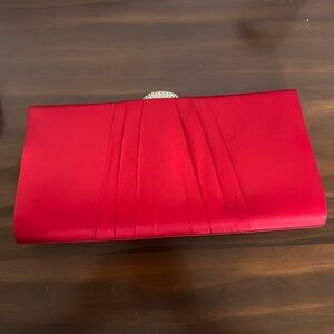 Red satin clutch